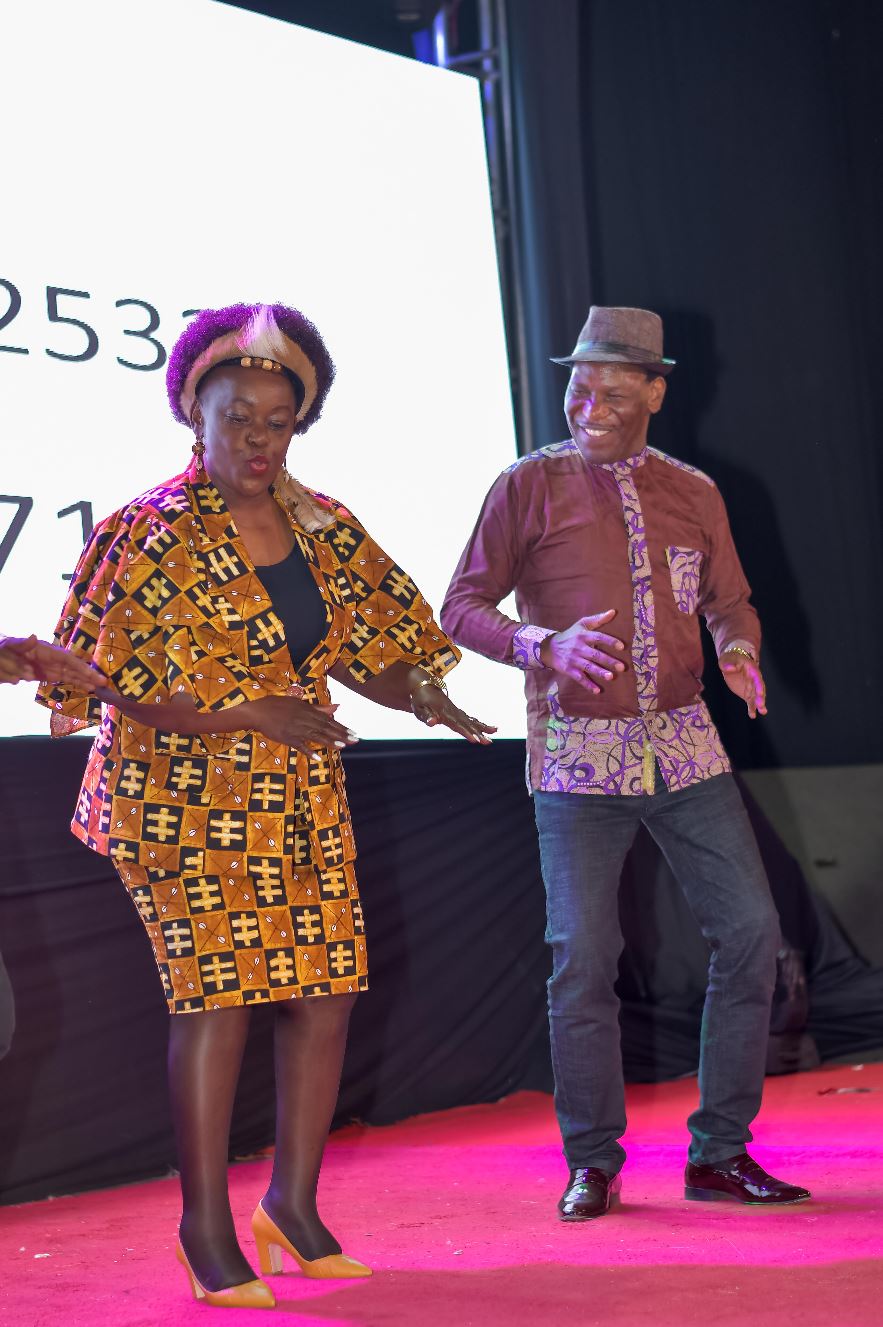 Hon Millie Adhiambo and Music Copyright Board Chairman Ezekiel Mutua breaking a dance at the Heritage Pageant Event 2024